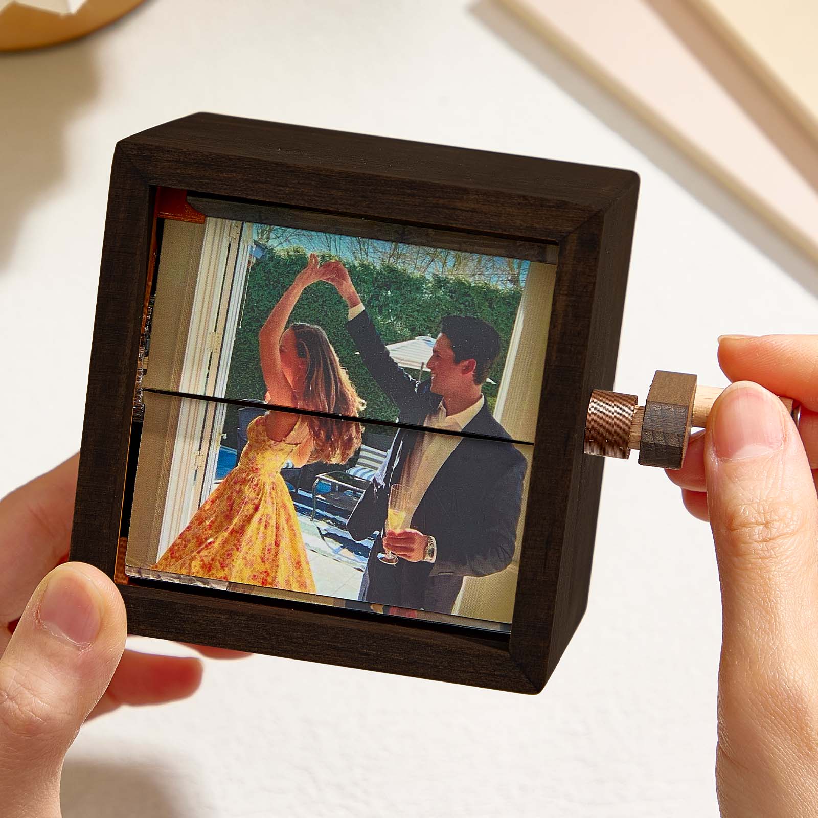 Custom photo flipbook frame, hand-cranked animation, black walnut baby cube—an inventive gift for treasured memories