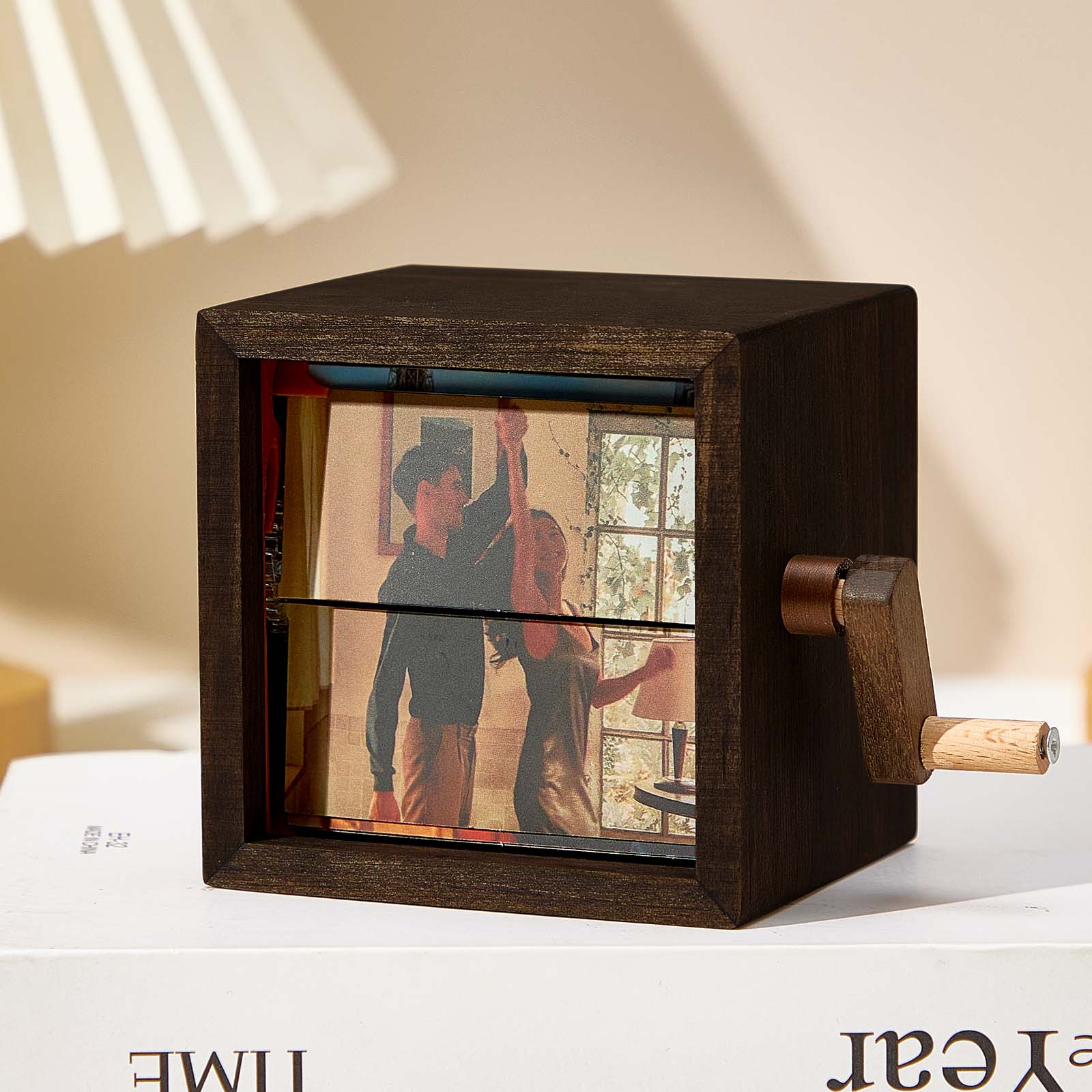 Custom photo flipbook frame, hand-cranked animation, black walnut baby cube—an inventive gift for treasured memories