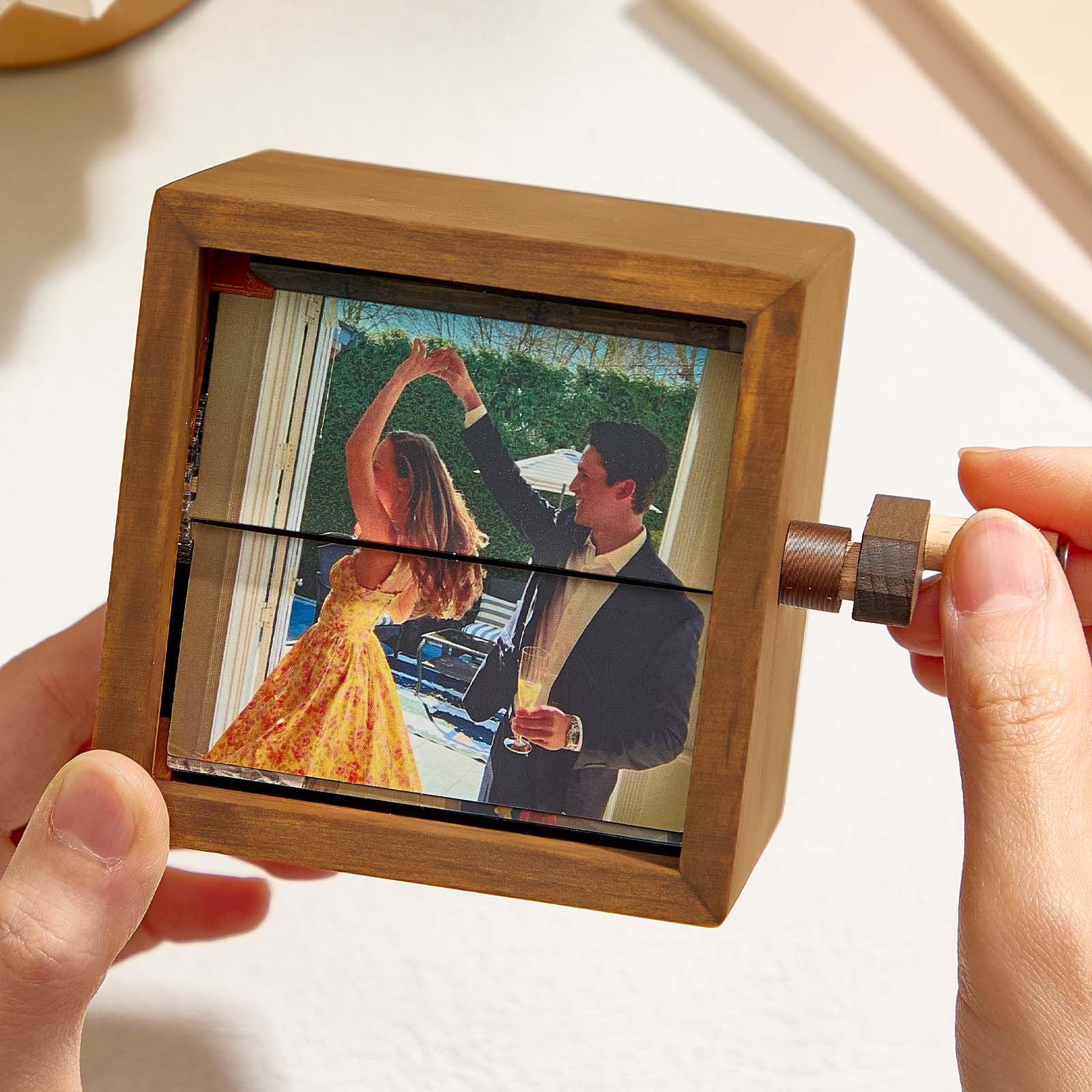 Custom photo flipbook frame, hand-cranked animation, black walnut baby cube—an inventive gift for treasured memories